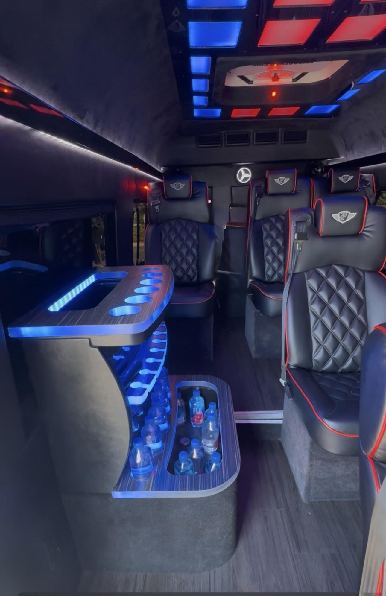 13 PASSENGER MERCEDES SPRINTER WITH CAPTAINS CHAIRS AND WATER COOLER BAR